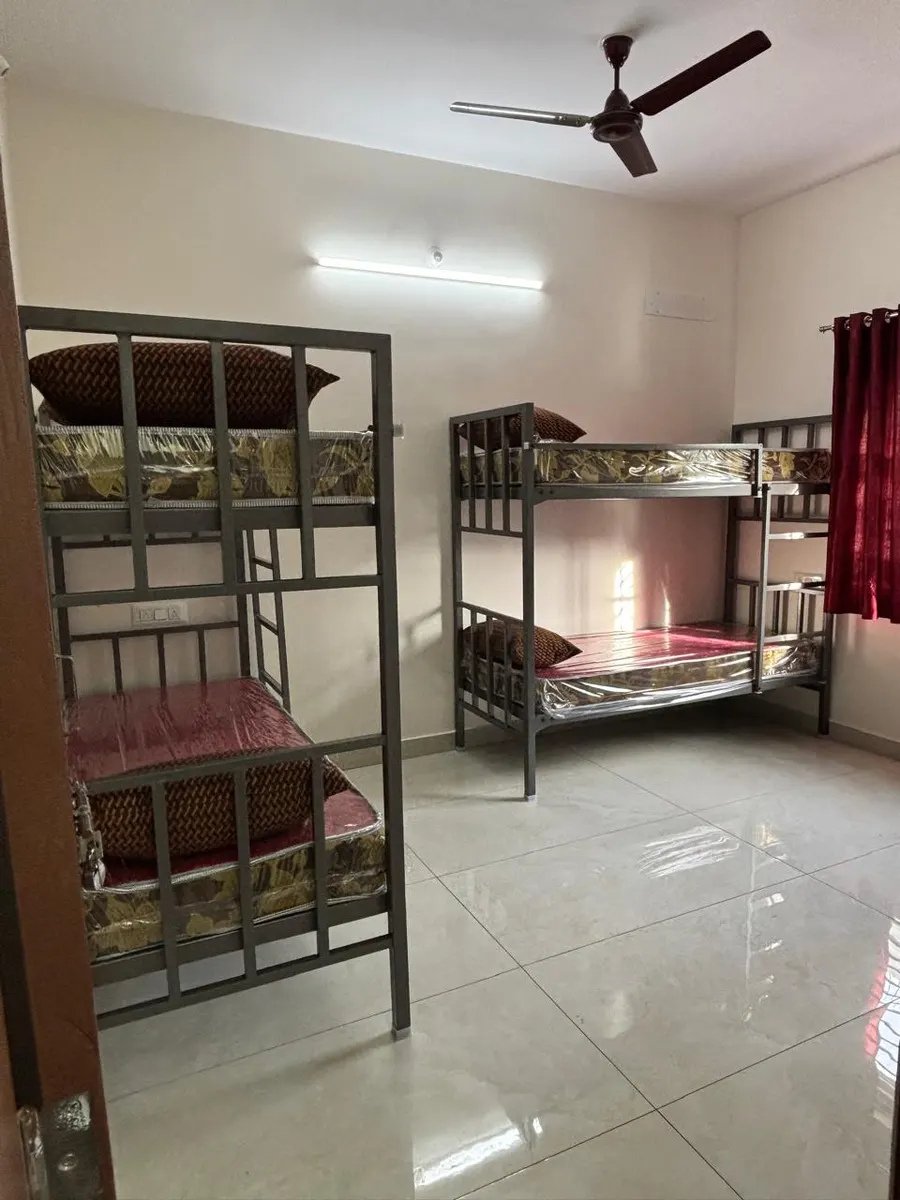 Furnished room with bunk beds at Friends PG